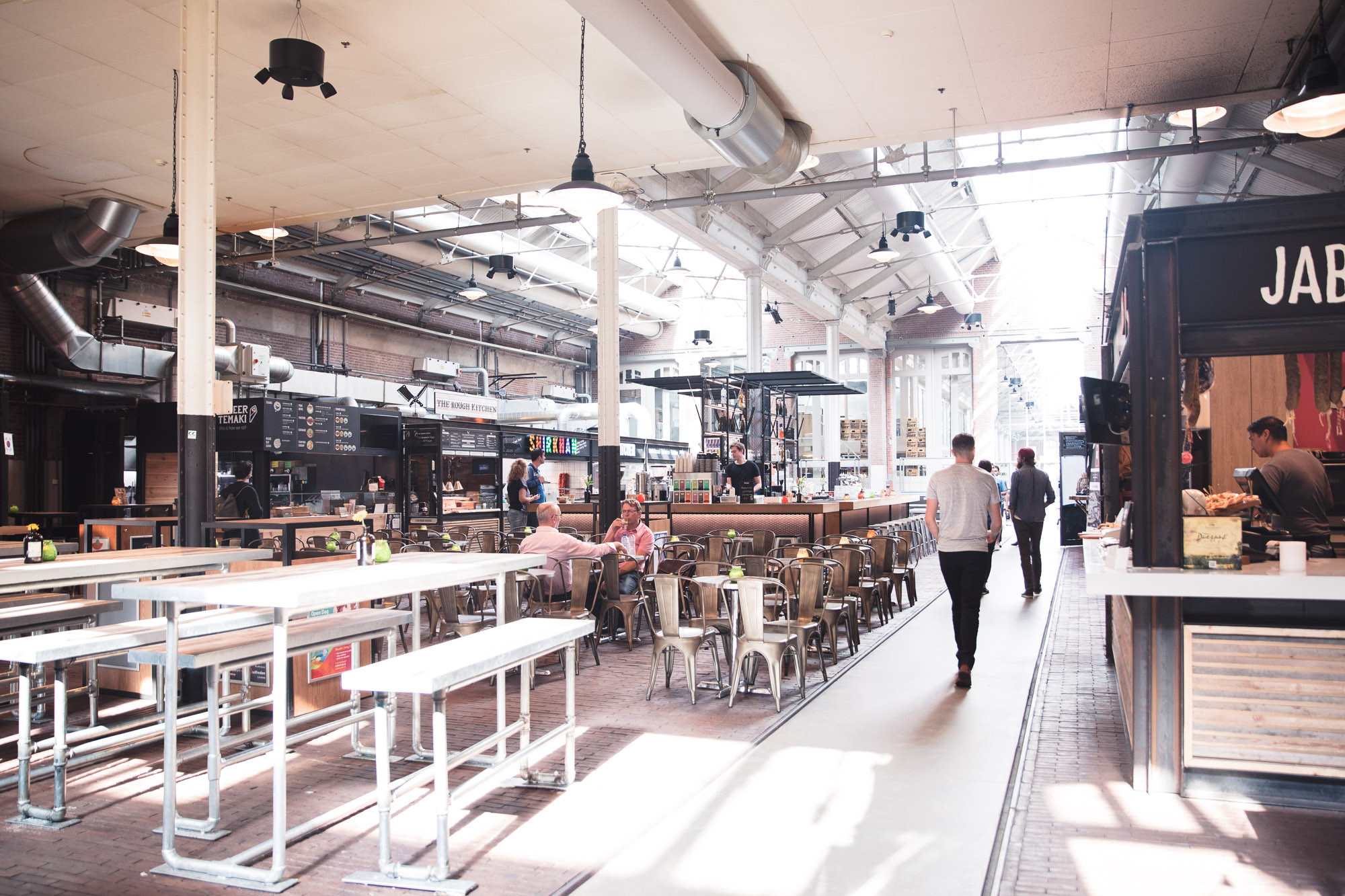 Foodhallen in Amsterdam's Jordaan oud west district, delicious food stalls in the city center of Amsterdam, Netherlands