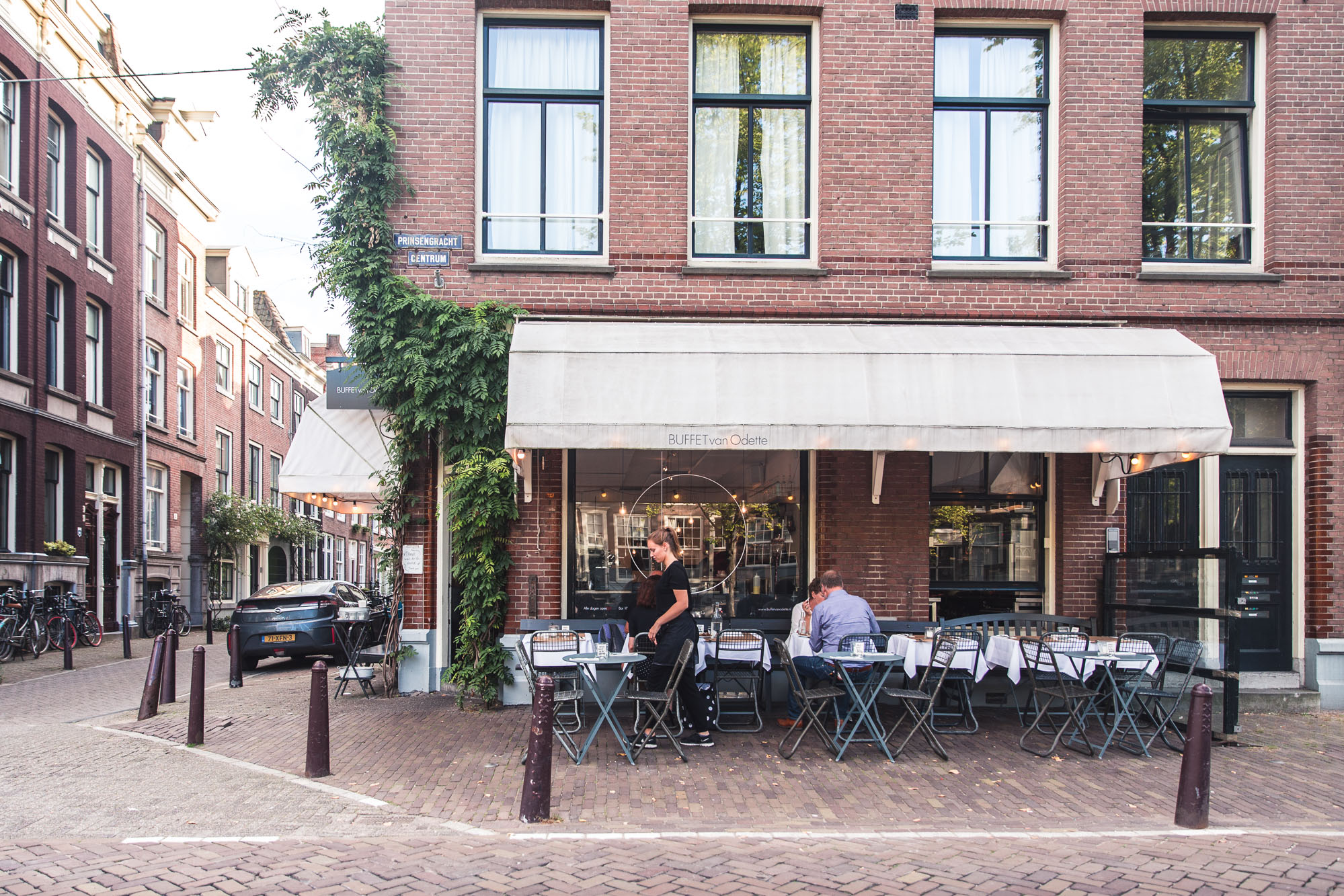 Outdoor patio on the canals at Buffet Van Odette on the prinsengracht in Amsterdam, Holland, The Netherlands