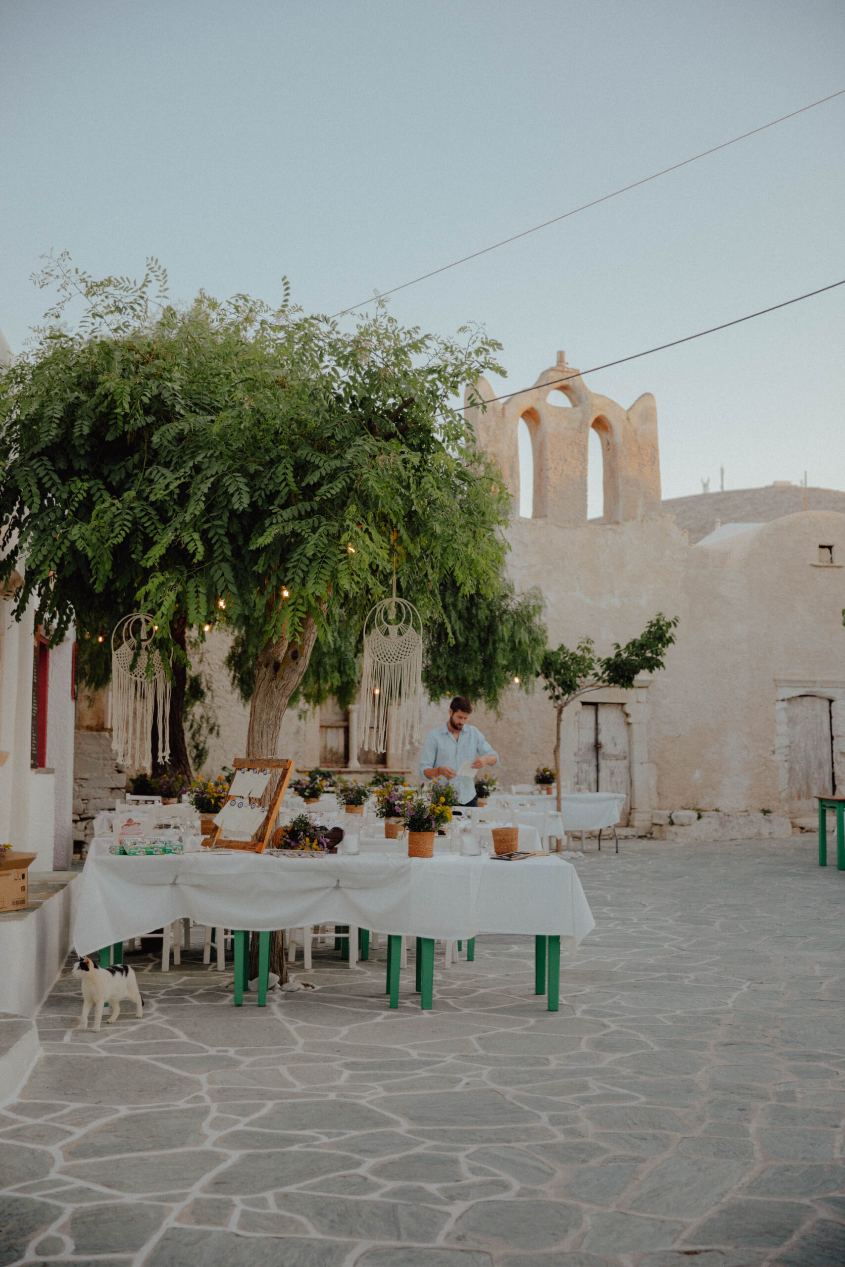 Chora main square at night Folegandros with traditional tavernas, local restaurants and authentic Greek island atmosphere