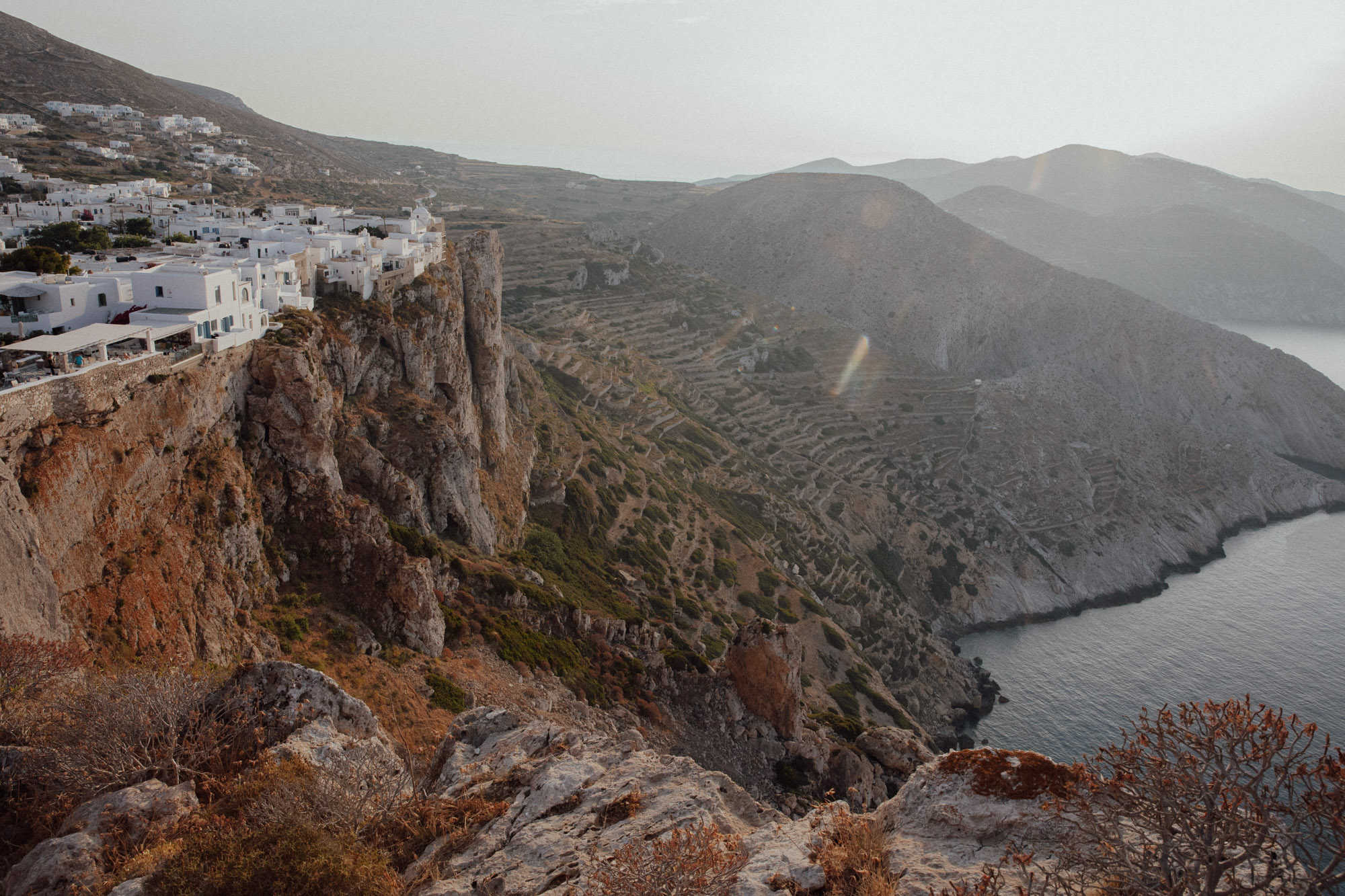 Spectacular sunset from Church of Panagia Folegandros with panoramic views across Aegean islands