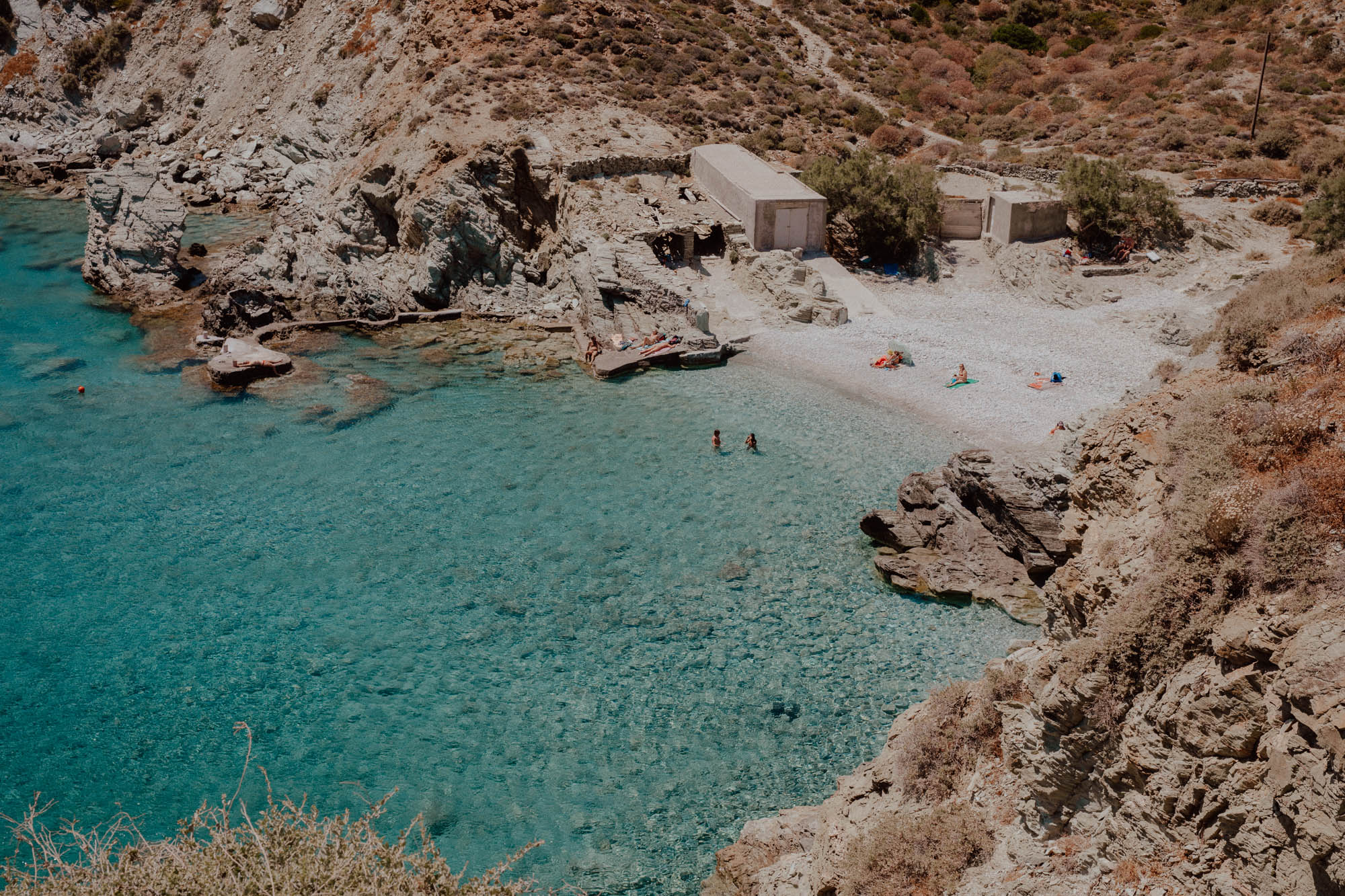 Secluded Galifos Beach Folegandros with pristine waters, rocky shoreline and natural swimming cove
