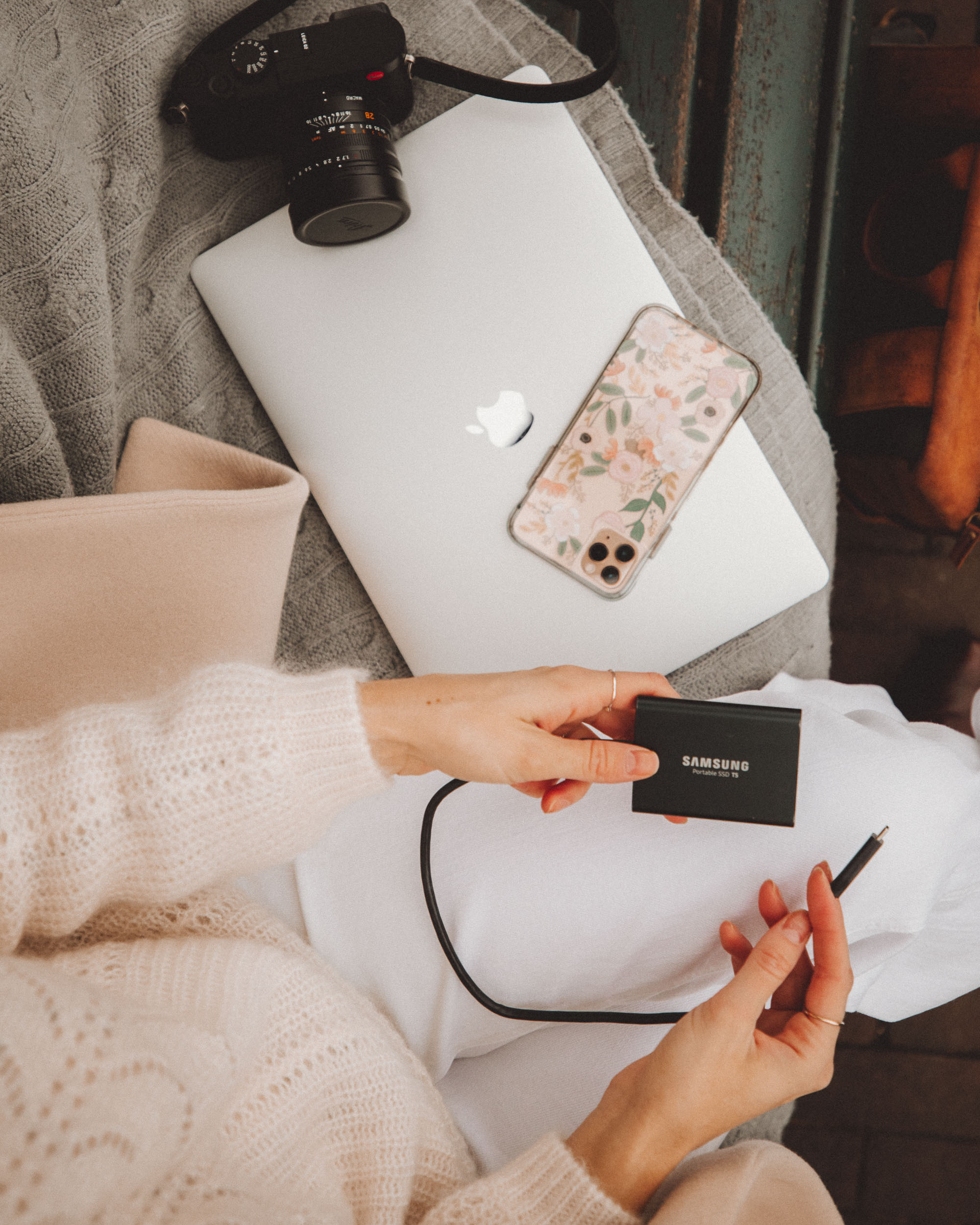 Hard drives and camera used for photo organization process