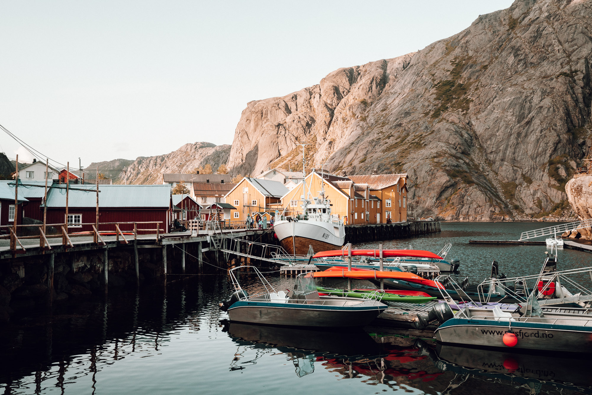 View from Lofoten Hotel in Norway Nusfjord Arctic Resort Traditional Fishermen Red Cabin with a Fjord View - Find Us Lost