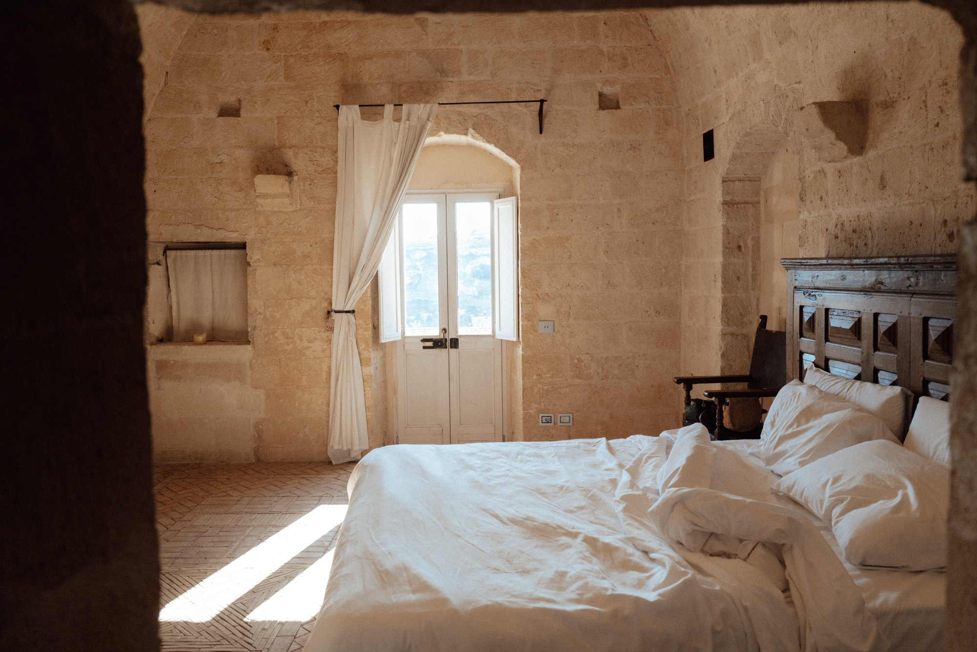 The bedroom at sextantio le grotte della civita the original cave hotel in matera italy