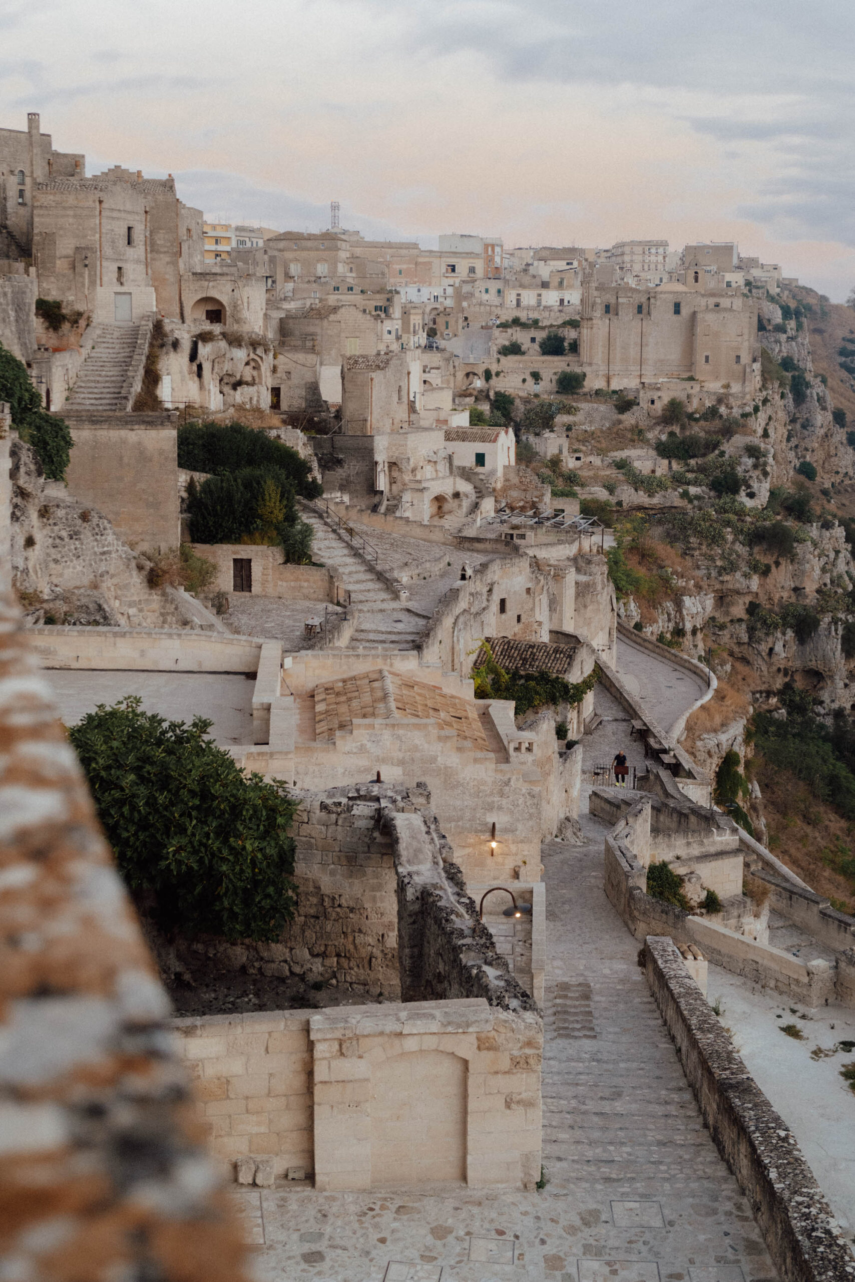 Morning sunrise over Matera Italy ancient Sassi cave dwellings and stone buildings from Sextantio Hotel