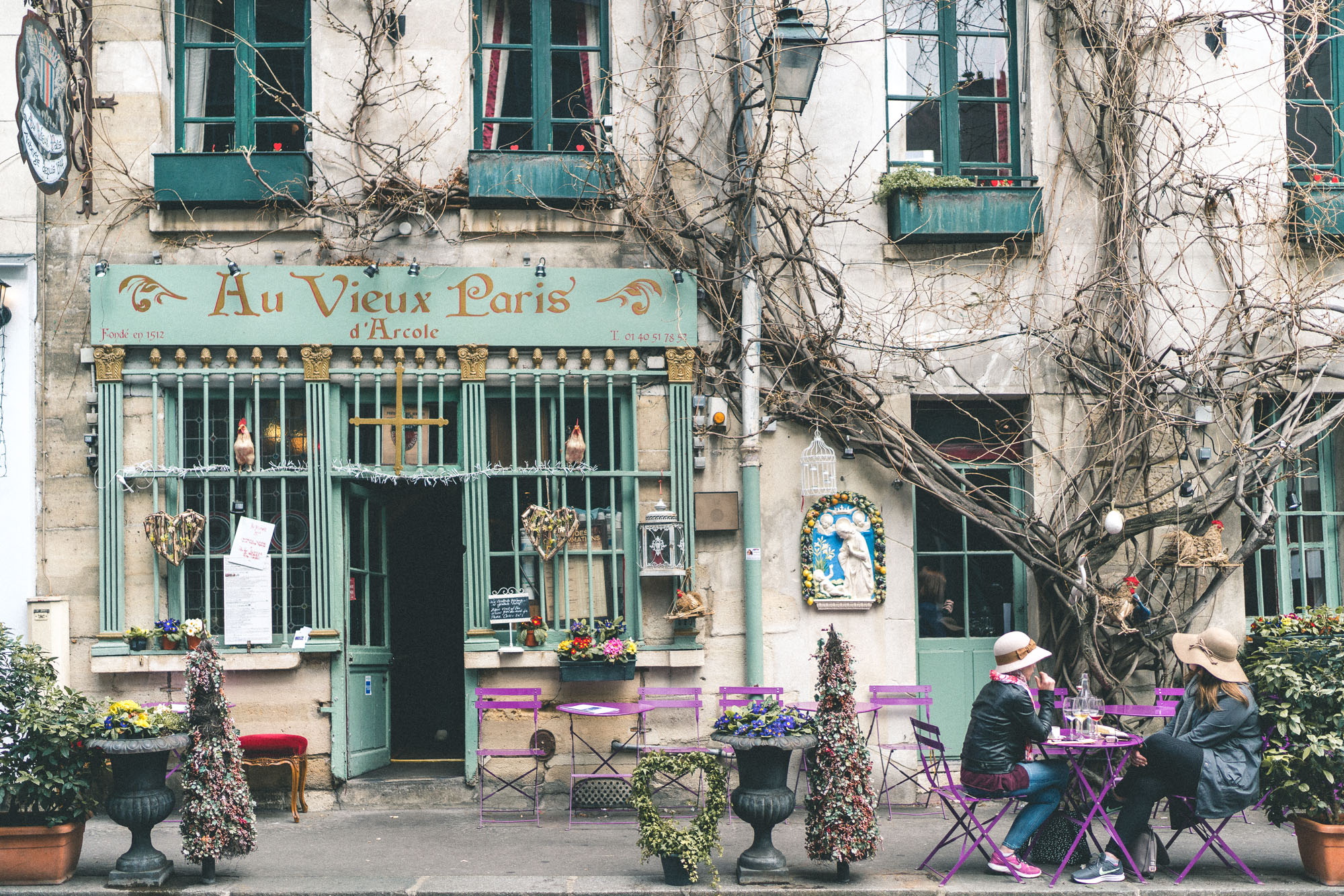 Photogenic facades in Paris Ile de la Cite - Café Au Vieux Paris D’Arcole - Complete Paris Travel Guide