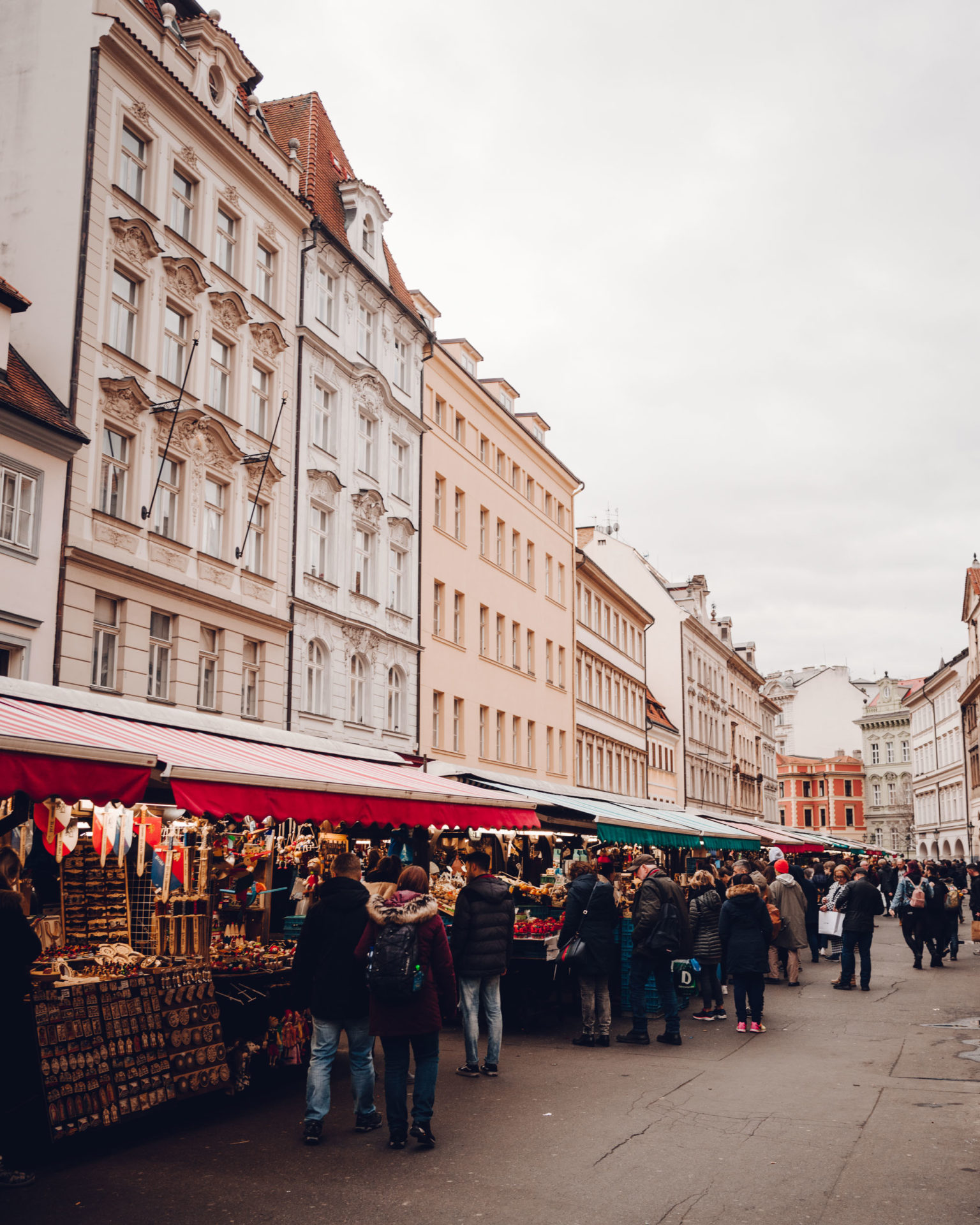 Pastel houses and outdoor market in Prague, Czech Republic