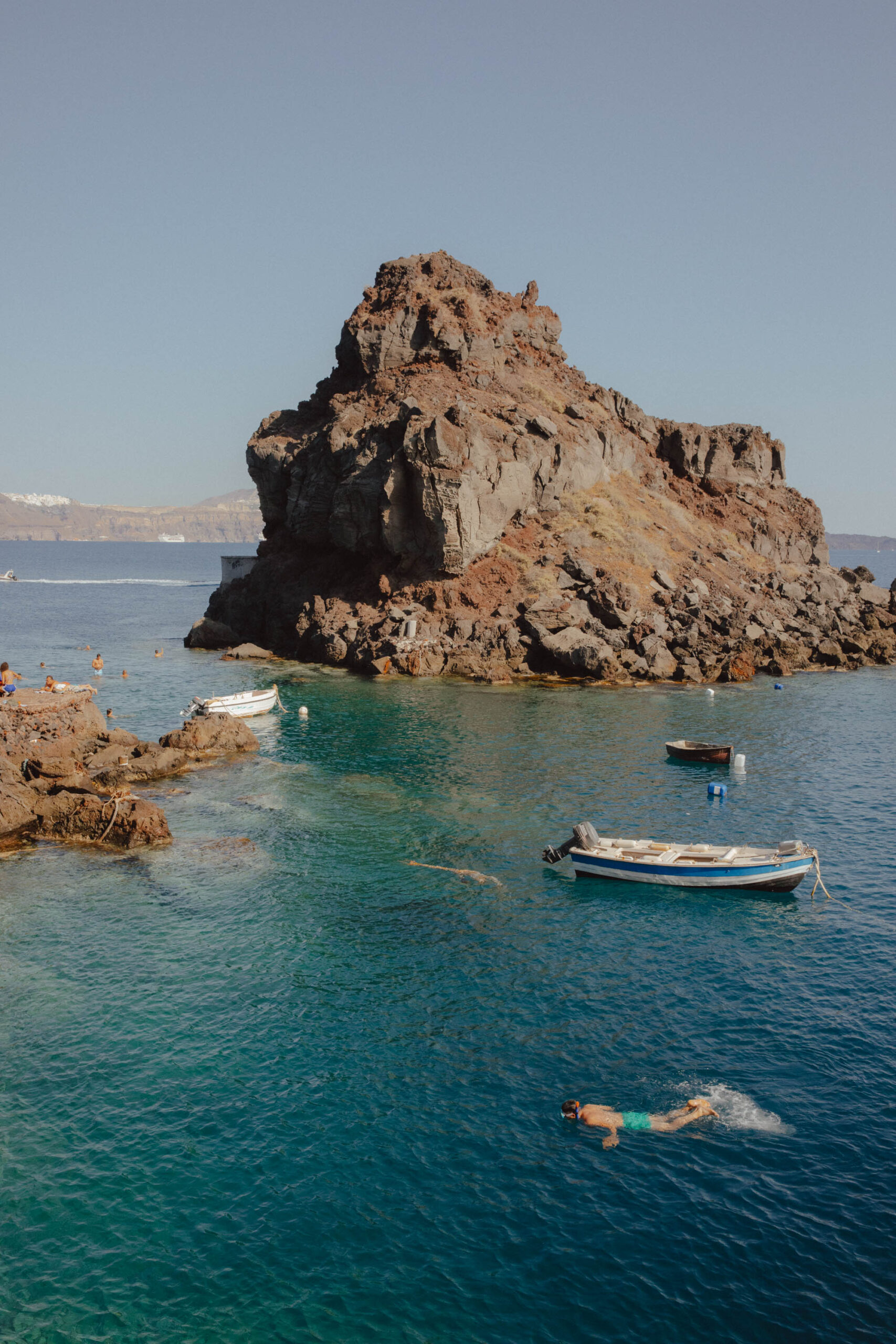 Agios Rock in Santorini, Greece, where you can swim and cliff jump.