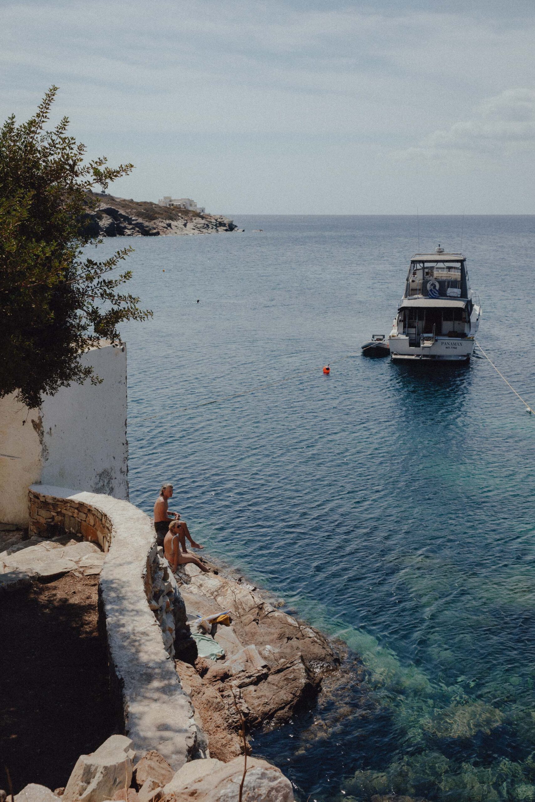 Swimmers at Faros Beach in Sifnos with clear water, a favorite beach near top accommodations highlighted in this Sifnos guide.