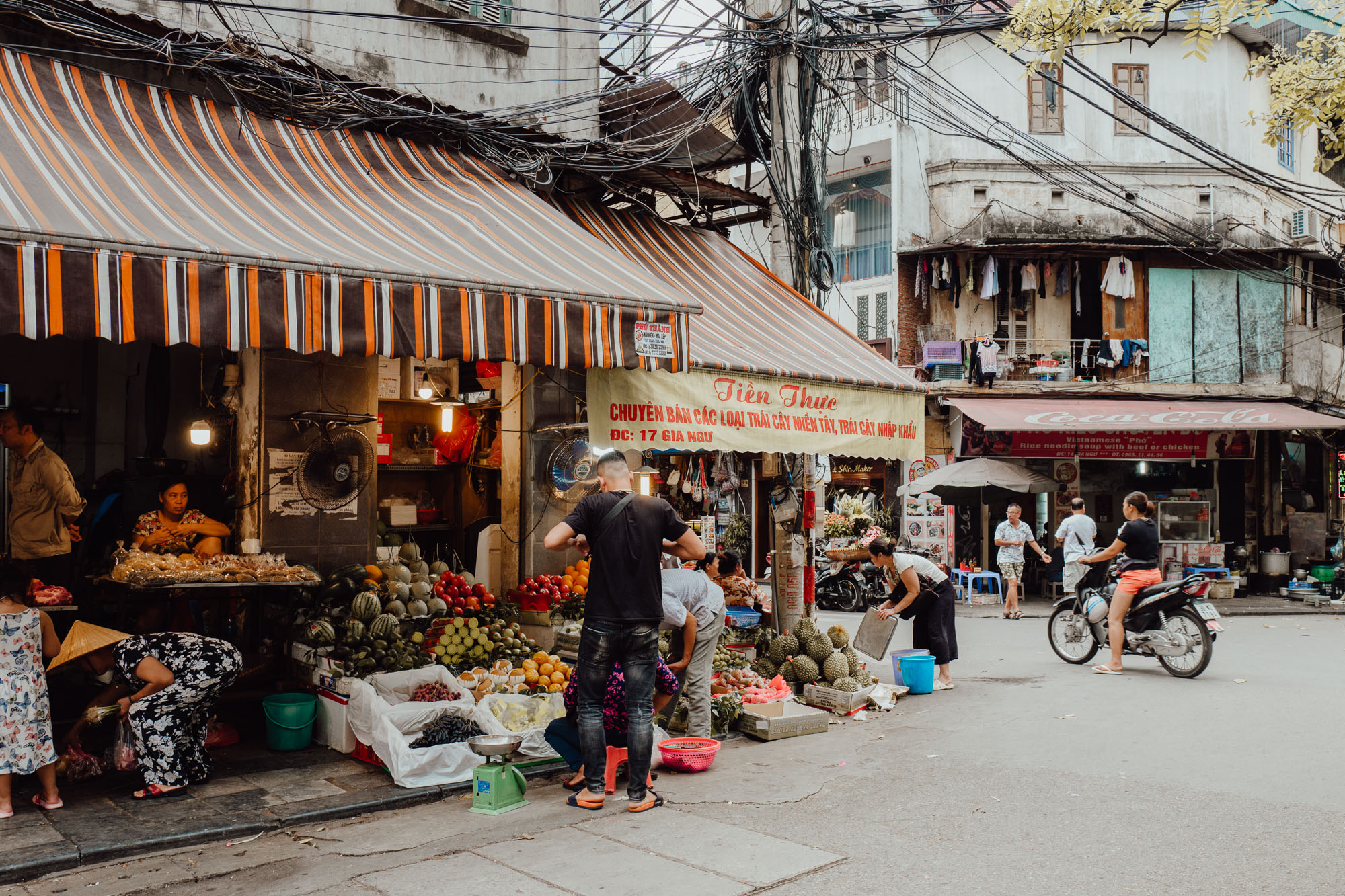Streets and fruit shops in Hanoi Vietnam