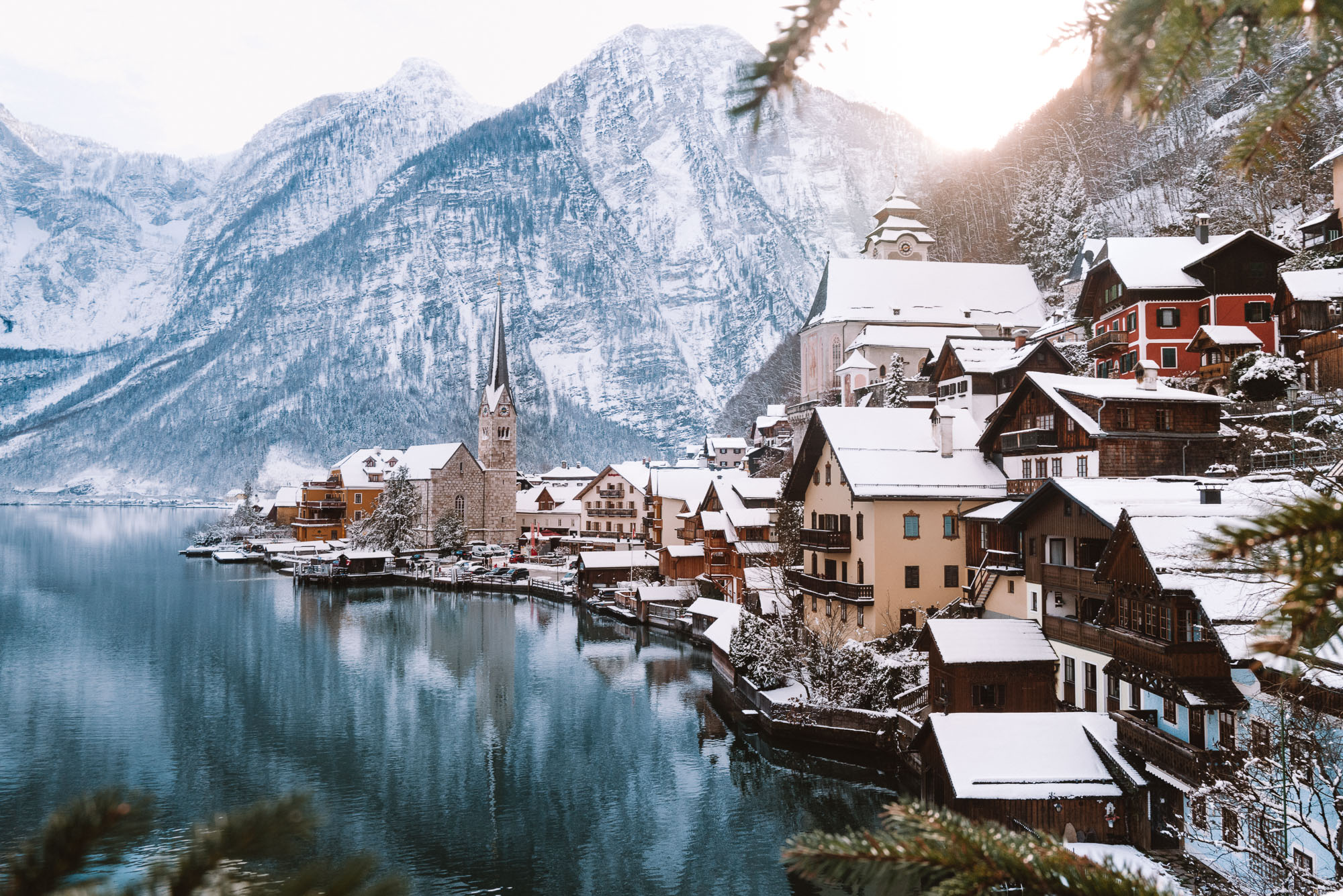 Hallstatt Austria view in winter of church and lake in the snow