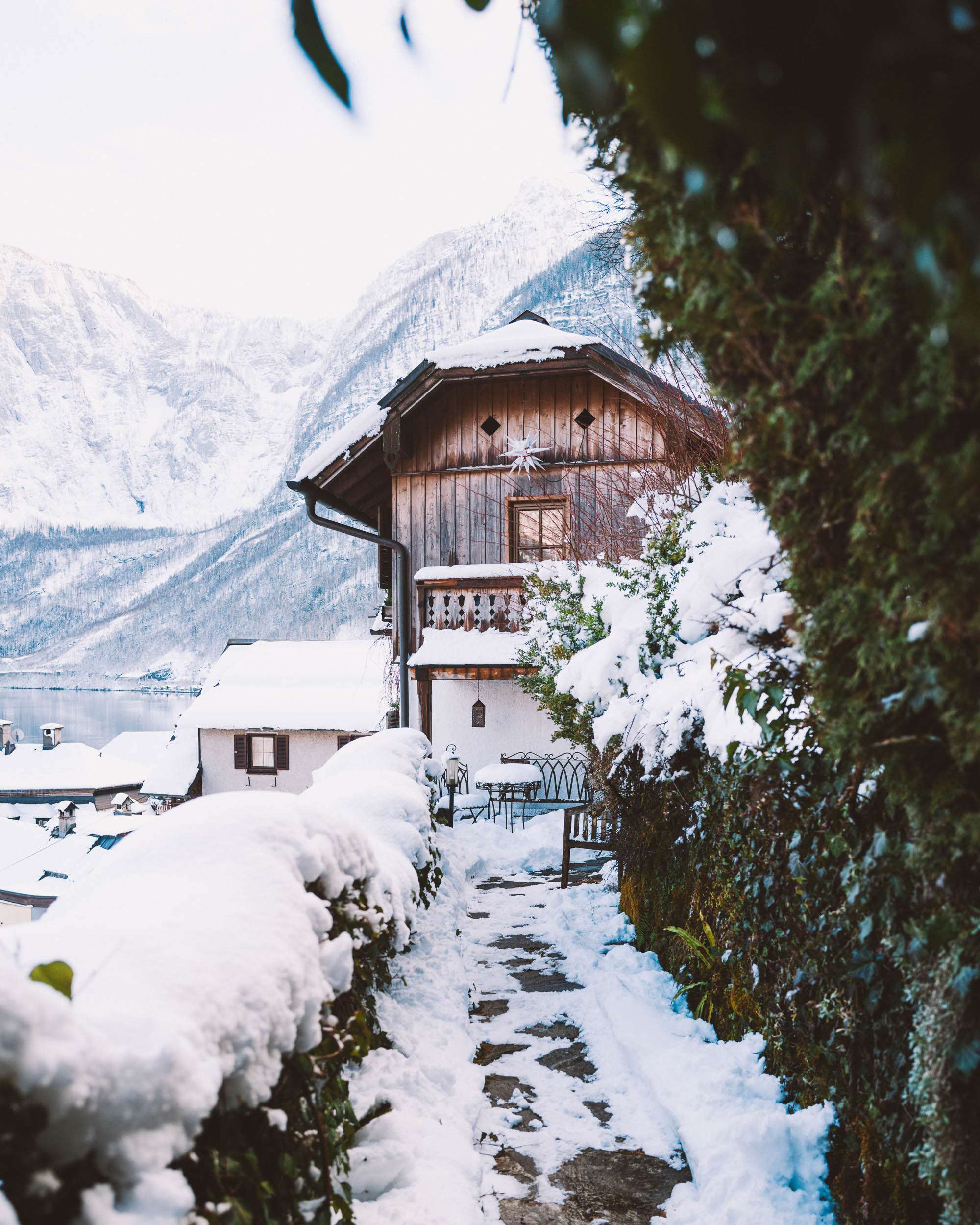 Snow covered homes and paths in Hallstatt Austria in winter