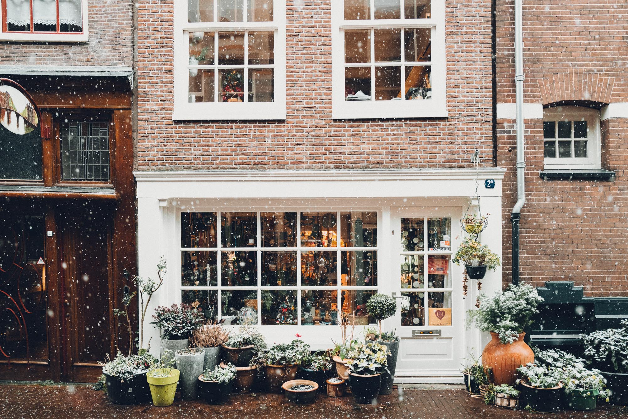 Amsterdam dutch houses in the snow Find Us Lost