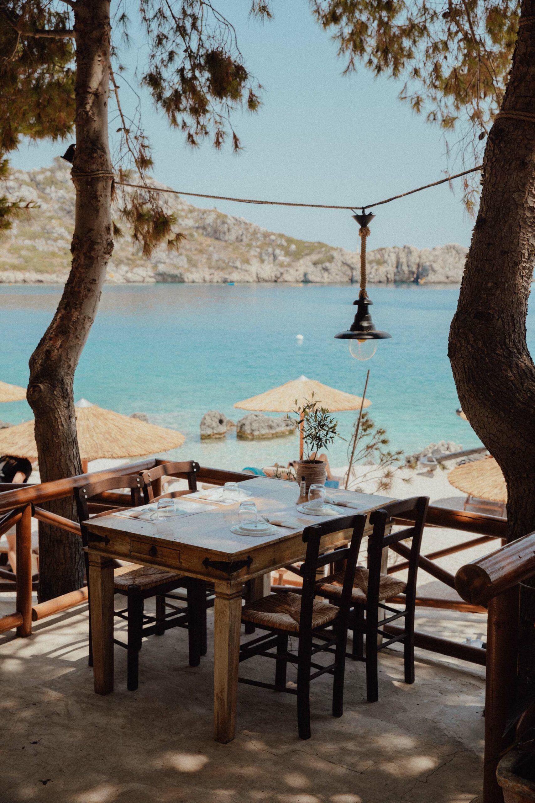 Tables by the water at Nobelos bio restaurant in Zakynthos Greece